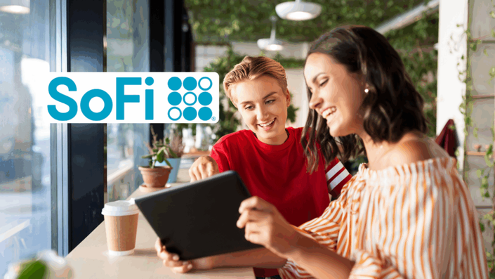 Two young women sitting at a café table, smiling and looking at a tablet together. A coffee cup and potted plants are on the table. The SoFi logo is displayed in the top left corner.